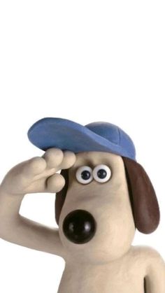 a cartoon dog wearing a blue hat and holding his hands up to his face with one hand