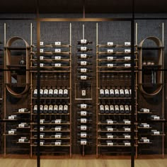 the wine rack is full of bottles and glasses in front of a wall with shelves