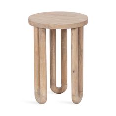 a small wooden table with two legs and a circular design on the top, sitting against a white background