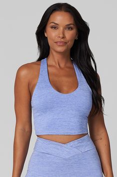 A perfect fit for any active lifestyle, the Built-In V-tank offers mid to full coverage and support with a built-in shelf bra and padded cups. This V-neck, racerback tank gives you a comfortable and secure fit for whatever your day has in store for you. The Details: Supportive Built-in shelf bra with removable pads V-neck Racerback 87% Polyester, 13% Spandex Racerback Activewear With Built-in Bra For Light Exercise, Racerback Sports Bra With Built-in Padding For Light Exercise, Racerback Tank Top With Built-in Bra And 4-way Stretch, Fitted Tank Top With Built-in Padding, Sporty T-back Halter Top For Sports, Light Exercise Racerback Sports Bra With 4-way Stretch, Scoop Neck Tank Top With Built-in Padding For Gym, Stretch Tank Top With Built-in Padding, Scoop Neck Gym Tank Top With Built-in Padding