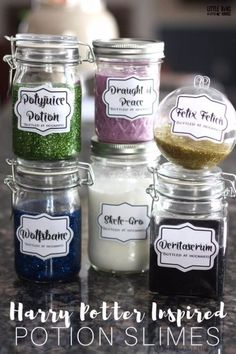 harry potter inspired potton slimes are on display in glass jars with glitter lids