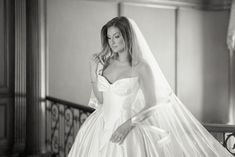 black and white photograph of a woman in a wedding dress