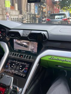 the interior of a car with an entertainment system