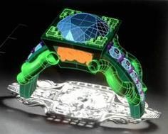 a green and orange object sitting on top of a silver plate with an intricate design