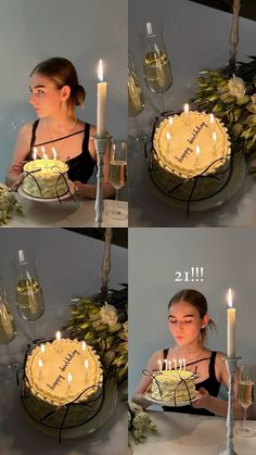 a woman sitting at a table in front of a cake with lit candles on it