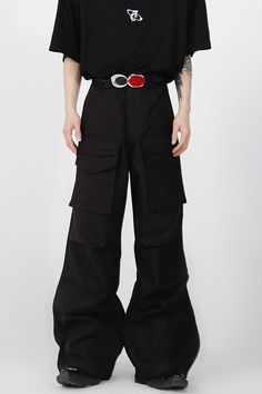 Argue Culture presents these black and light grey trousers as part of their Spring/Summer '22 collectionMaterial: 100% polyester oversized fitunisexthe male model is wearing a size X-Large / 1.79m (5'9ft) and 58kg (128lbs)Machine wash / hand wash with water under 40°CNo bleachIroning reversed with low temperatureFlat to dry Measurements in (cm) Size Waist Hip Length Thigh M 75 100 107 44 L 79 104 108.5 45 XL 83 108 110 46 Overalls For Men, Skirt Streetwear, Style Cargo Pants, Straight Fit Pants, Chic Shirts, Flared Sleeves Top, Chic Skirts, Summer 22, Style Cargo