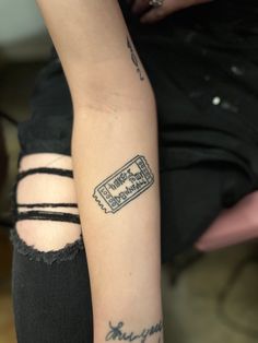 a person with a tattoo on their arm