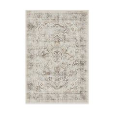 an antique style rug in grey and beige tones