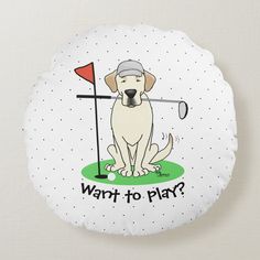 a white dog with a hat and golf ball on it's back is sitting in front of a round pillow that says, want to play?