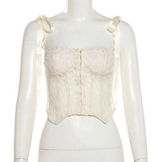 Please refer to our sizing chart for a guideline when choosing a size. 5 business days order processing time. 90% polyester 10% spandex Chic White Corset With Adjustable Straps, Elegant Cami Corset With Adjustable Straps, Fitted Beige Tank Top With Straps, Chic Fitted Tops With Hook And Eye Closure, Fitted Tops With Bow Straps For Spring, Fitted Top With Bow Straps For Spring, Fitted Party Tops With Tie Straps, Chic Sleeveless Top With Hook And Eye Closure, Fitted White Top With Adjustable Straps