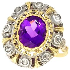 A stunning antique 5.92 carat amethyst and 0.32 carat diamond, 18 karat yellow gold and silver set dress ring; part of our diverse antique jewelry and estate jewelry collections. This stunning, fine and impressive antique amethyst ring has been crafted in 18k yellow gold with a silver setting. The pierced decorated, ornamented scrolling setting is ornamented with a central bezel set 5.92Ct oval mixed cut amethyst. The amethyst is surrounded by a total of eight individually silver bezel set Dutch Antique Amethyst Ring, Unconventional Engagement Rings, Amethyst And Diamond Ring, Amethyst Gem, Purple Band, Amethyst Jewelry, Dress Rings, Antique Jewellery, Amethyst Ring