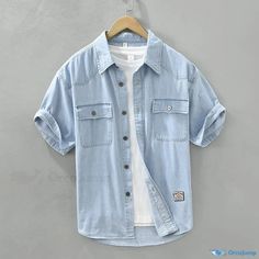 OrcaJump - Loose-Fit Casual Short-Sleeve Denim Shirt for Artistic and Leisure Wear Casual Washed Denim Short Sleeve Top, Casual Washed Denim Top With Short Sleeves, Casual Light Wash Cotton Denim Top, Light Blue Cotton Denim Top With Pockets, Casual Blue Denim T-shirt, Light Blue Streetwear Tops With Pockets, Light Blue Casual Half Sleeve Top, Light Blue Half Sleeve Casual Top, Medium Wash Short Sleeve Cotton Denim Top