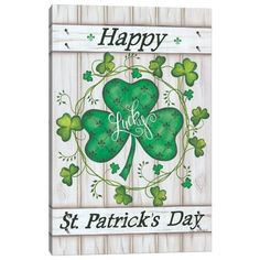 a st patrick's day sign with shamrocks on it and the words happy luck