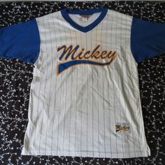 Pre-Owned In Great Shape-Gently Worn-Unique & Classic Jersey Style Mickey Baseball Shirt Vintage Rare Mickey Sport Tshirt Jersey #92 Disney Fashions Made In Usa L/Xl Pit To Pit 23 Shoulder To Shoulder 22 Top To Bottom 30 3/4 Sleeve 9 1/3 Jersey Style, Shirts Vintage, Baseball Shirt, Disney Shirts, Baseball Shirts, Disney Style, Sport T Shirt, Made In Usa, Blue White