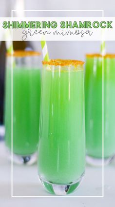 three glasses filled with green drinks on top of a white table next to each other