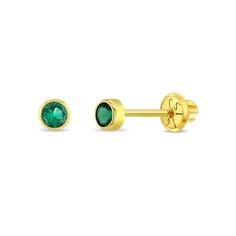 Classic, petite and sparkly, these 3mm simulated emerald birthstone stud earrings set in 14k gold for baby girls are perfect for daily use. Featuring a bright green cubic zirconia stone in a bezel setting, these girl's earrings are ideal for a babies first ear piercing. Crafted entirely of 14k gold, these kid's earrings are suitable for sensitive ears, featuring the very precious material and craftsmanship. The threaded safety screw back design secures them to your childs ears, making them condu First Ear Piercing, Emerald Birthstone, Baby Earrings, Gold Jewelry Earrings, Kids Earrings, Ear Piercing, Stud Earrings Set, Girls Earrings