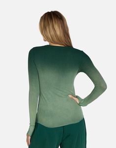 Made in LA 95% Siro Viscose 5% Spandex Wash Cold, Lay Flat to Dry ML Signature Soft Rib Knit Fabric Thumbhole Cutouts Fitted Silhouette Reactive Dye Stretch Fit Model & Fit Info Modeled in Size S Fitted Tee, Size Up If Unsure Height: 5' 9" / Waist: 23" / Bust: 31" / Hip: 34" Green Fitted Long Sleeve T-shirt, Stretch V-neck Tops With Thumbholes, Fitted Green Tops With Thumbholes, High Stretch Casual Long Sleeve Top For Layering, Green Stretch Long Sleeve Top With Crew Neck, Fitted Long Sleeve Modal Top, Fitted Modal Long Sleeve Tops, Stretch Modal Long Sleeve Tops, Green Casual Long Sleeve Top For Layering