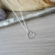 A little heart for a little love.An 11mm Sterling Silver Heart pendant hung on a Sterling Silver Chain Necklace.✭ CUSTOMIZE YOUR PIECE ✭► Choose your chain length 16in or 18in options for No Additional Charge! Don't see the length you need? Check out our Custom Length Upgrade: https://www.etsy.com/ca/listing/198366701/custom-chain-length-upgrade► Upgrade to a Thicker Chain here:https://www.etsy.com/ca/SilverMooseArts/listing/817185940/chain-upgrade-sterling-silver-chain► You can also personalize Heart Minimalist, Heart Simple, Custom Chain, Modern Heart, Sterling Silver Heart Pendant, Silver Heart Pendant, Sterling Silver Chain Necklace, Silver Chain Necklace, Necklace Sterling Silver