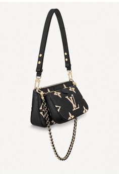 Brand New Multi Pochette Accessoires Bicolor Monogram Empreinte Black/ Cream. Comes with Box, Dustbag, Tags, and Removable Chain/Strap. Guaranteed Authentic! "The Multi Pochette Accessoires cross- body bag takes on a striking aspect in embossed black Monogram Empreinte leather, overprinted with the Monogram motif in a cream color. Just the right size to carry a woman's essentials, this two-in-one bag keeps things organized with its removable pouches. It's comfortable to wear thanks to its supple Bolsa Luis Viton, Luis Viton, Louis Vuitton Handbags Black, Pochette Louis Vuitton, Louis Vuitton Multi Pochette, Coach Tote Bags, Lv Bags, Luxury Purses, Louis Vuitton Pochette