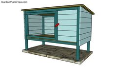 a blue chicken coop with a red arrow pointing to the door and window on it