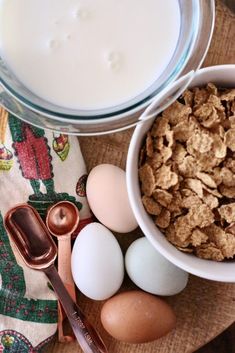 ingredients to make baked oatmeal sitting on a table next to a glass of milk