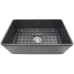 a large black sink with grids on the bottom