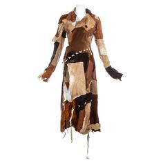 Dolce & Gabbana goat hide and leather patchwork coat with wrap fastening on the waist, raw edges and leather blanket stitches and tassels throughout. Fall-Winter 2002 Upcycled Coat, Patchwork Leather Jacket, Wool Maxi Coat, Blanket Stitches, Dream Wishlist, Patchwork Coat, Upcycle Clothes Diy, Dream Fashion, Leopard Print Coat