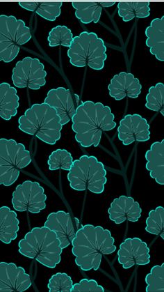 a black background with green flowers and leaves