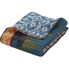 two blankets folded on top of each other with different colors and patterns, one is multicolored