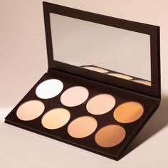 You asked for a contour palette, we came through! This large sized palette is a must have for all your contour and highlighting needs! This matte contour palette contains 8 silky powders that blend effortlessly into the skin for the perfect contour every time. Use the darker shades for a chiseled, striking contour and the lighter shades under your eyes and other high points of the face for an instant lifting effect. No matter if you're a master makeup artist or just starting to try new makeup te Contour Pallet, Perfect Contour, Bronzer Palette, Matte Bronzer, Face Palette, Contour Kit, Bronzing Powder, Contour Palette, Makeup Bronzer