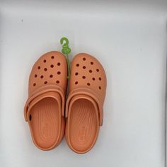 Elevate Your Style With These Vibrant Papaya-Colored Crocs Classic Platform Clogs. Slip Them On And Stay Comfortable All Day, Thanks To Their Lightweight, Breathable Design. Perfect For Travel And Casual Occasions, These Slip-On Clogs Feature A Platform Heel Style That Adds A Touch Of Glamour To Your Look. Crafted From High-Quality Synthetic Material, These Clogs Are Built To Last. The Us Shoe Size Is 8 And The Eu Shoe Size Is 37. With A Brand Like Crocs, You Know You're Getting Quality Footwear Casual Orange Clogs With Round Toe, Casual Orange Round Toe Clogs, Orange Synthetic Clogs With Round Toe, Orange Casual Synthetic Clogs, Orange Synthetic Casual Clogs, Casual Orange Synthetic Clogs, Pretty Clothing, Shoes Crocs, Platform Clogs