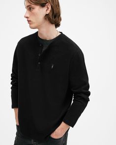 An easy essential? This is it. The Rowe is a long-sleeve henley shirt made from organic cotton with a waffle texture that's super soft to touch. Complete with flatlock stitching and our signature Ramskull embroidery, it's the perfect piece for casual days.  This henley is designed to a regular fit that is true to size Three button placket Long sleeve Waffle fabric with a soft handfeel Ramskull embroidery Flatlock stitching Allsaints Long Sleeve Fall Sweatshirt, Fall Henley With Relaxed Fit And Henley Neckline, Fall Waffle Knit Henley With Henley Neckline, Allsaints Long Sleeve Tops For Spring, Fall Waffle Knit Henley, Long Sleeve Cotton Henley With Ribbed Cuffs, Cotton Long Sleeve Henley With Ribbed Cuffs, Everyday Long Sleeve Waffle Knit Sweatshirt, Everyday Waffle Knit Long Sleeve Sweatshirt