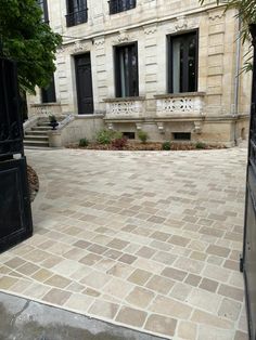 an entrance to a building with steps leading into it