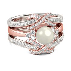 Elegant and sparkling, this rings set will be a nice holiday gift for yourself or loved one. The engagement ring features a 6mm faux pearl at the center, flanked on each side by three cluster stones. Crafted in two tone sterling silver, inspired from infinity, the two coordinating bands are set with round stones for a glistening look. Treat yourself as a holiday gift with this graceful piece.Carat Weight: 1.5 ctStone Size: 6 mmStone Type: Jeulia® StoneNumber of Stones: 1 Stone Color: Diamond WhiteStone Shape: RoundCarat Weight: 1.19 ctStone Size: 2,1.1 mmStone Type: Jeulia® StoneNumber of Stones: 86 Stone Color: Diamond WhiteStone Shape: RoundWeight: 7.7 gWidth: 14 mmHeight: 4.07 mmThickness: 6.5 mmMaterial: 925 SilverPlating Color: Silver, Rose Gold Swarovski Jewelry Rings, Enhancer Ring, Sterling Silver Promise Rings, Sterling Silver Wedding Rings, Silver Engagement Rings, Swarovski Jewelry, Wedding Rings For Women, Silver Diamonds, Wedding Ring Sets