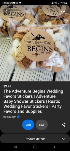 the adventure begins wedding favors stickers are in a plastic bag with white marshmallows