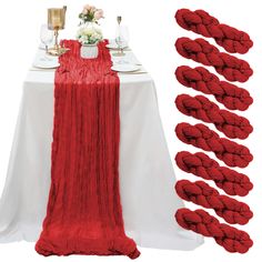 the table is set up with red linens