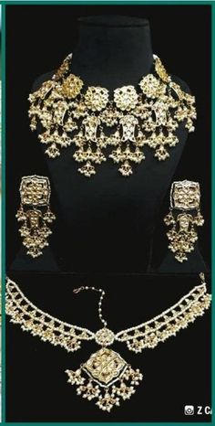 Product Description: * Bollywood kundan bridal set, kundan mathapatti, kundan necklace set, designer kundan jewellery, Punjabi kundan jewellery,kundan bridal jewel * The base metal color is Gold tone studded with kundan along with beads work on it. * This Jewelry set would add more charms to your beautiful jewelry collection and would surely bring lots of compliments . * Note:- This is an artificial Jewelry Set. * Care Instructions: Keep it dust-free & dirt free in a plastic pouch. Remember to apply your hairspray, perfume, and cosmetics before putting your jewellery on.   The measurement and color may be different slightly Shipping Policy: We Ship Worldwide from India within 24-48 Hours of receiving confirmed payment.  All the items are shipped through India Post with the service of Regis Kundan Necklace With Gota Work, Gold Kundan Choker With Gota Work, Ceremonial Hand Set Kundan Necklace, Ceremonial Kundan Necklace Hand Set, Kundan Choker With Gota Work For Wedding, Gold Kundan Bridal Necklace With Mirror Work, Temple Jewelry Wedding Choker With Mirror Work, Kundan Jewelry Set With Gota Work For Wedding, Kundan Bridal Necklace With Mirror Work For Festivals