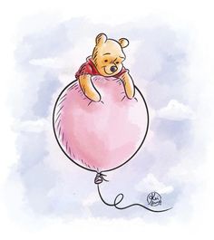 a winnie the pooh balloon floating in the sky with its head on top of it