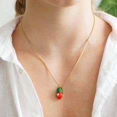 Add a splash of color and fun to your day with our Murano Glass Strawberry Necklace. Part of our bijoux collection, this funky and vibrant accessory brings sunshine and joy to any outfit. Handmade in Germany, the necklace features a charming Murano glass strawberry pendant paired with delicate freshwater pearls on a recycled, gold-plated stainless steel chain. Each piece is unique, showcasing artisanal craftsmanship. Measuring 45 cm, it's perfect for everyday wear or special occasions. Arrives b Funky Necklaces, Strawberry Necklace, Jewelry Magazine, September Birthstone Jewelry, Box Making, Zodiac Jewelry, Jewelry Ring Box, Pearl Jewellery Earrings, Men's Jewelry Rings