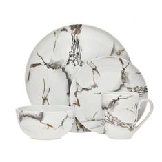 a white and black marble dinnerware set