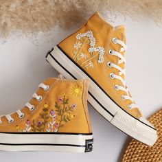 '' Custom Yellow Converse Hight Tops Chuck Taylor 1970s Embroidered Dandelions and Flower Garden, Valentine Gift, Wedding Gifts '' 🍀 Price includes Converse Shoes and Floral Embroidery Designs as shown 🍀 🍀 Shoe Type: Converse 1970s 🍀 Shoe color: 5. Yellow_1970s 1. DETAILS 🍀 You can send me your Converse, Vans, canvas shoes or I can buy them for you. Custom-ordered embroidered Vans and Converse shoes, please wait another 2-4 days. Each pair is hand embroidered to order, please make sure you put in the correct shoe size before you check out. The embroidery is meticulous and does not fade. 🍀 You will receive Vans and Converse shoes with floral embroidery designs as above. 2. PERSONAL EXPRESSION 🍀 Create your unique vibe by your own design of embroidery! In addition to the embroidery pa Embroidered Converse High Tops, 1970s Shoes, Embroidered Vans, Converse 1970s, Yellow Converse, Embroidered Converse, Womens Tie, Shoe Show, Valentine Gift