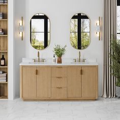 a bathroom with two sinks and mirrors on the wall next to a bookcase filled with books