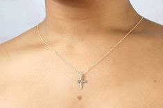 This minimal crucifix necklace is made of 14 karat gold filled.It's simple yet chic making it perfect as a baptism gift, holy communion or fashion accessory.All my pieces come boxed and ready for gift giving.Measurements:Pendant - 16mmWHAT IS GOLD FILLED?Gold filled material is solid gold bonded onto a base metal (copper). It contains 100 times more gold than gold plated jewellery. With daily wear your piece of jewellery can last up to 10 years! Rose gold filled is a great option for those with Minimalist Cross Jewelry For Baptism, Minimalist Cross Jewelry For First Communion, Gold Crucifix Necklace, Cross Necklace Gold, Crucifix Necklace, Gold Plated Jewellery, Gold Filled Necklace, Gold Bond, Gold Cross Necklace