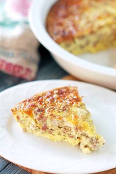 a slice of quiche on a white plate