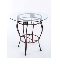 a glass table with metal legs and a round glass top on an isolated white background