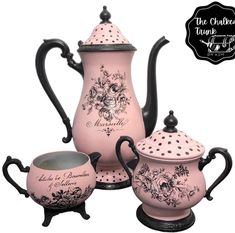 three pieces of pink and black tea set