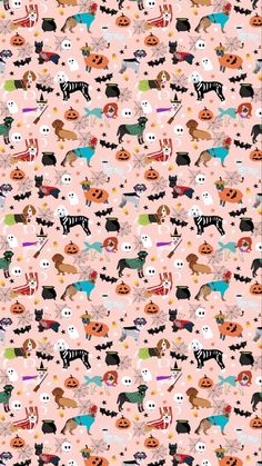 a pink background with dogs and pumpkins on it's side, all in different colors