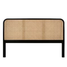 an upholstered headboard made out of wood and rattan with black frame