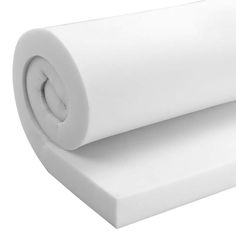 a roll of white paper sitting on top of a table