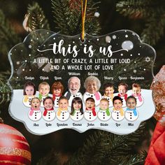 a christmas ornament hanging from a tree with pictures of people on it and the words, this is us